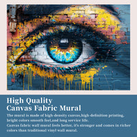 Colorful graffiti eye canvas wall mural with blue brick background and yellow paint splashes