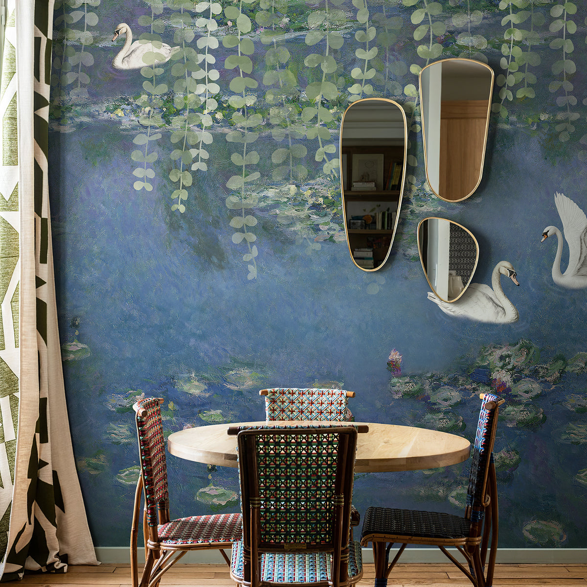Blue botanical swan mural in a stylish dining nook