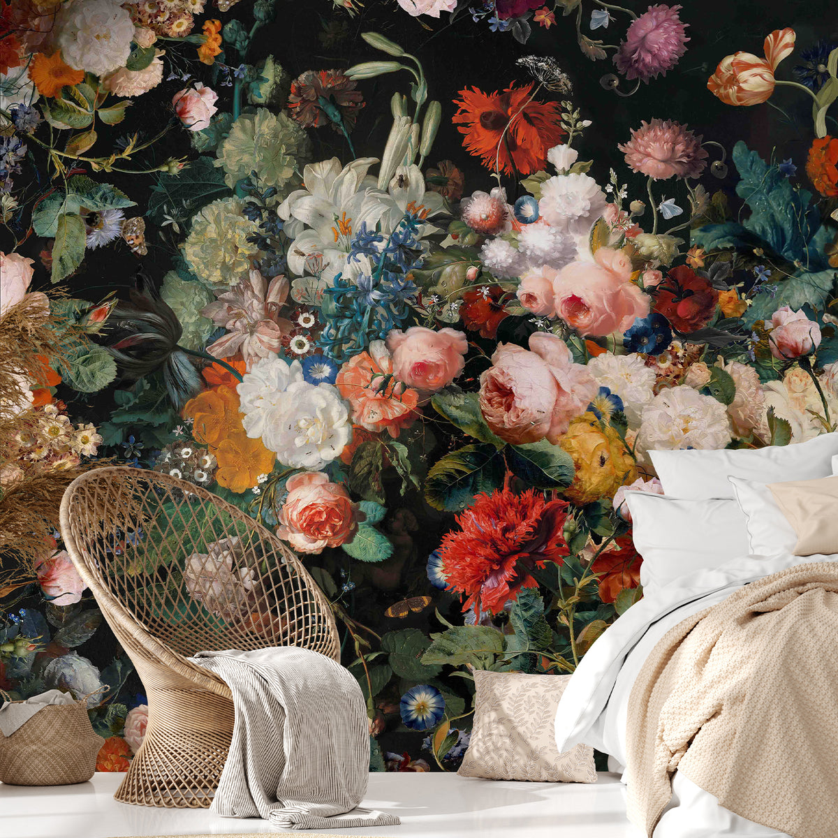 Vintage floral wallpaper mural with pink and cream blossoms beside a rattan chair and white bed