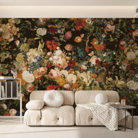 Richly colored floral wallpaper mural behind a cream curved sofa
