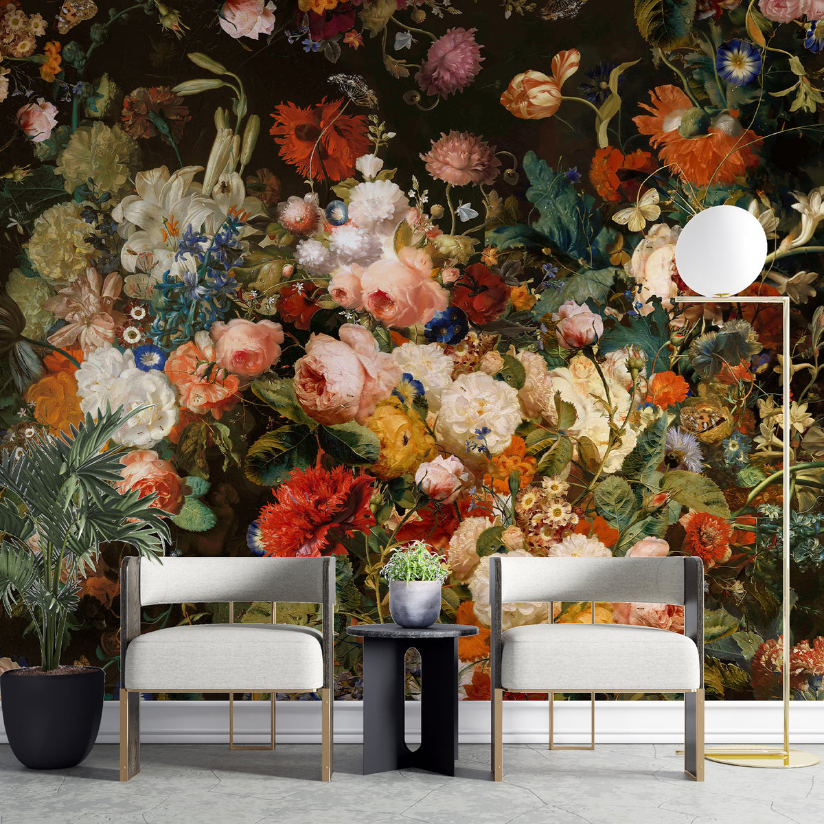 Colorful floral wallpaper mural on a dark background behind two white accent chairs