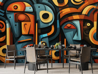 Colorful abstract face mural in a modern dining room