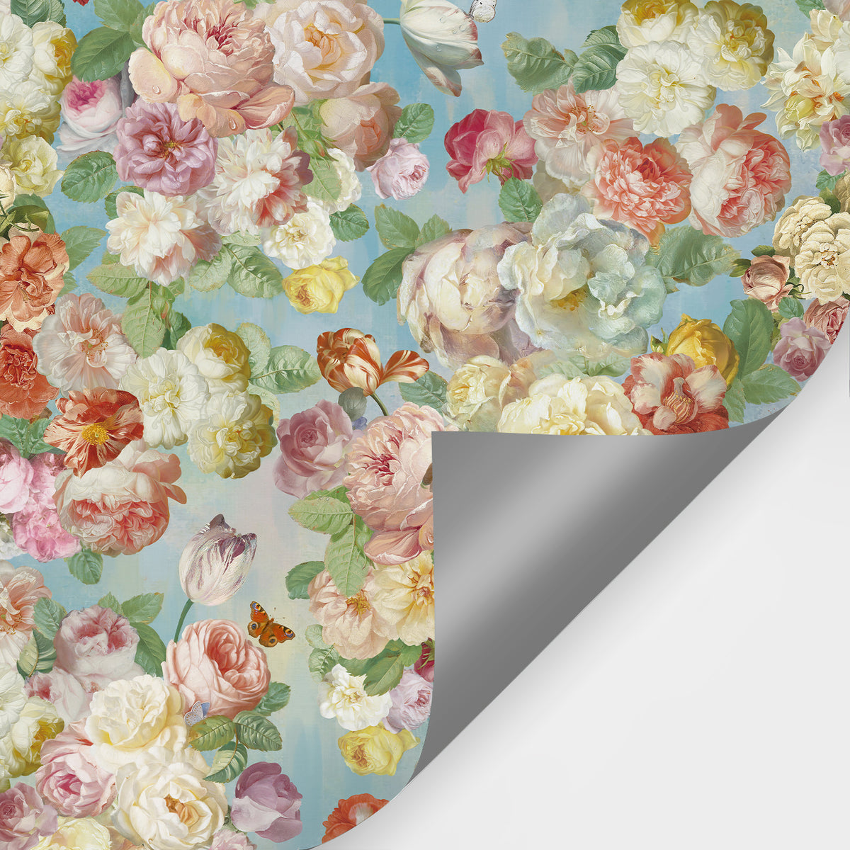 Pink, cream and yellow floral wallpaper mural with a curled corner revealing the backing