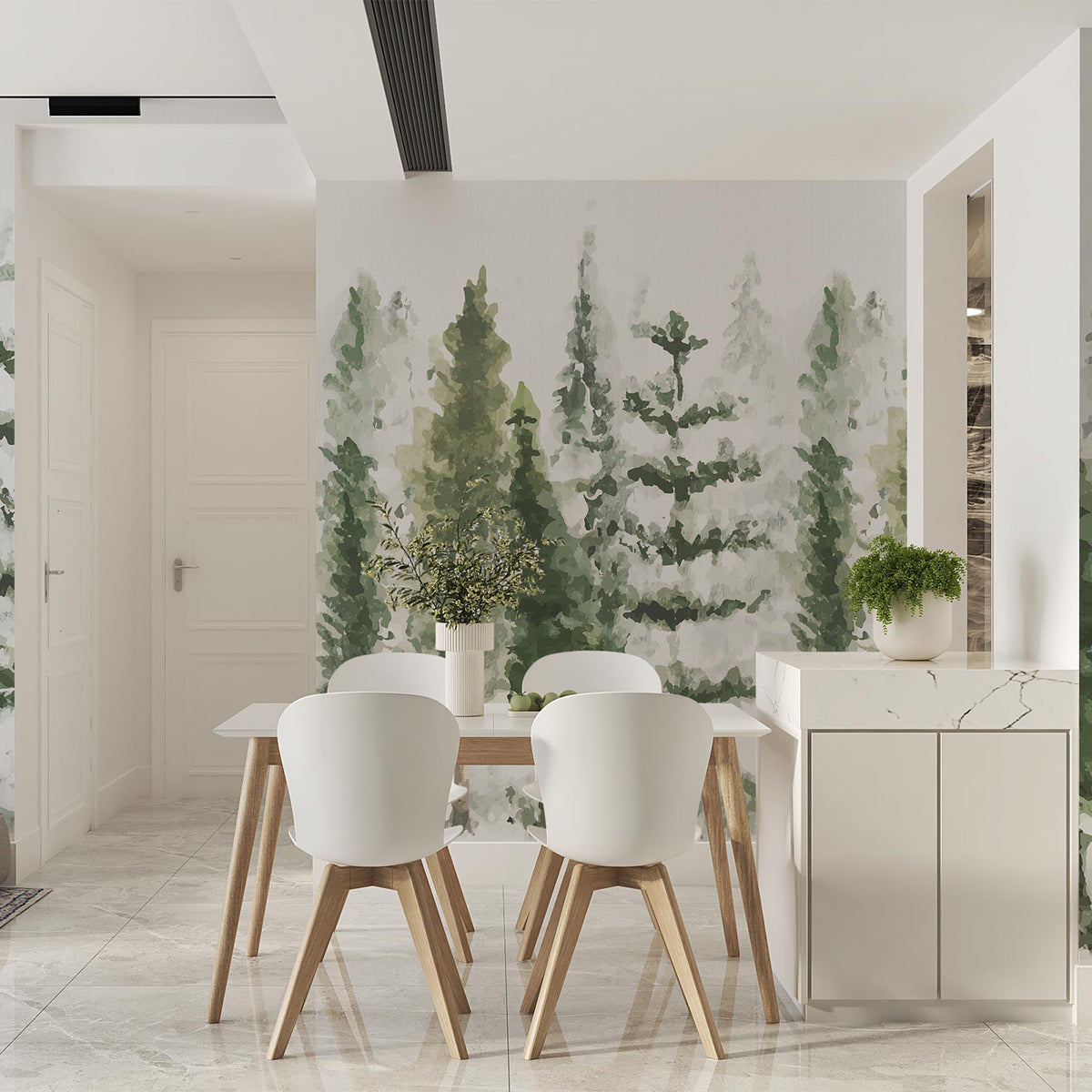 Soft green pine tree wallpaper mural behind a dining table with white chairs