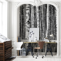 Monochrome birch forest wall mural in a bright Scandinavian home office