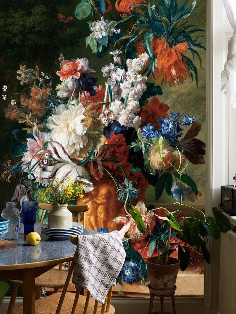 Moody floral wall mural with deep green background in a dark modern dining room