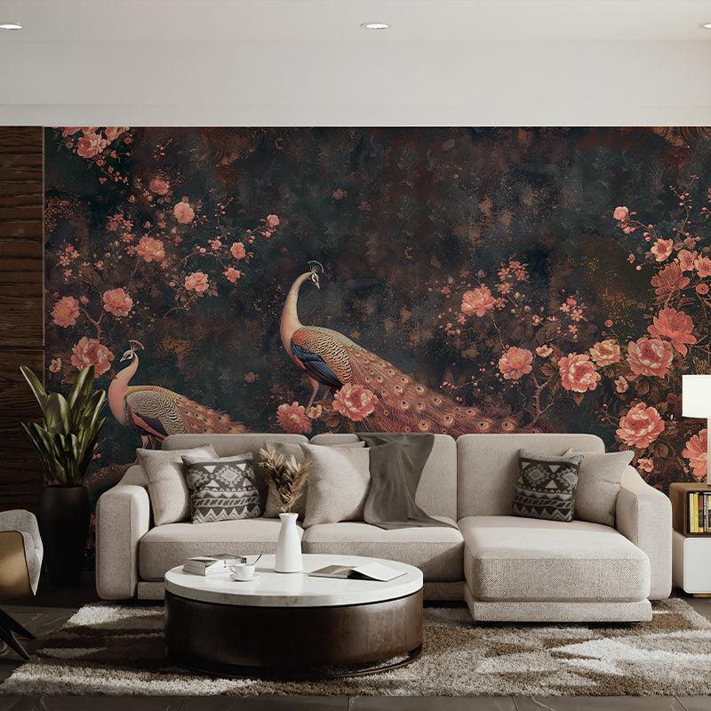 Peacock garden wall mural with dark botanical background behind a neutral sofa
